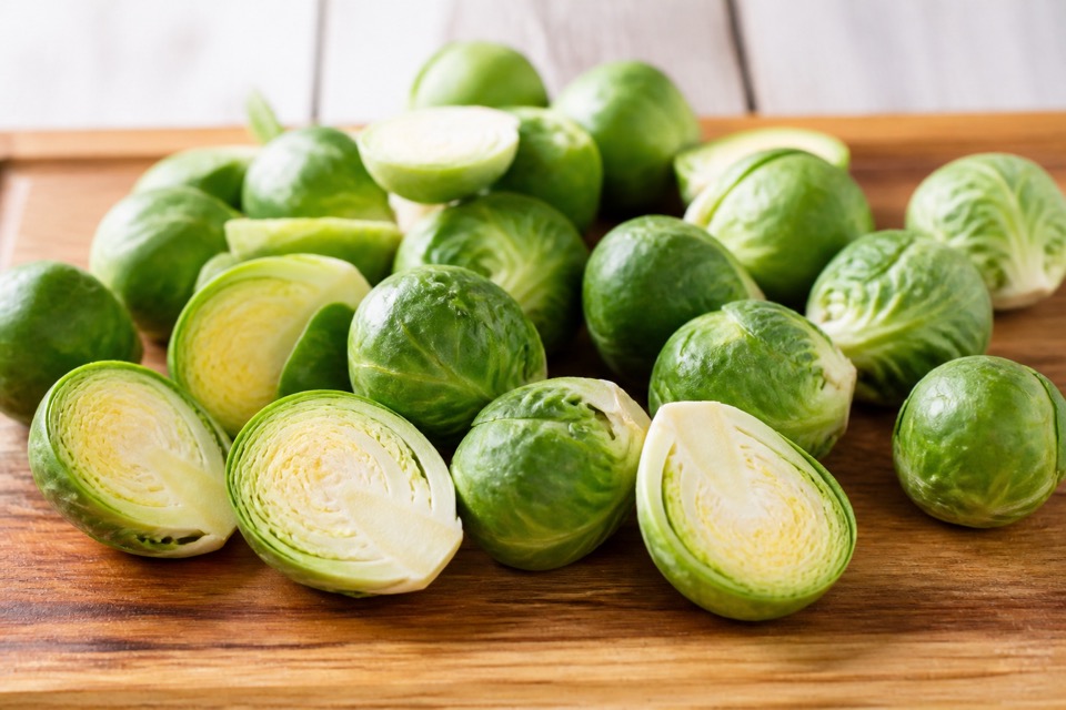 Plain cooked Brussels sprout pieces prepared for a dog