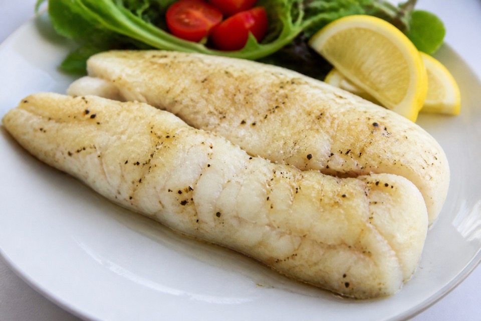 Plain cooked boneless fish prepared for a dog