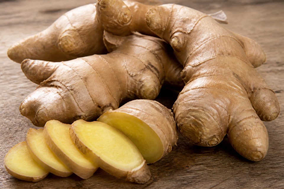 A tiny amount of fresh ginger kept separate from a dog