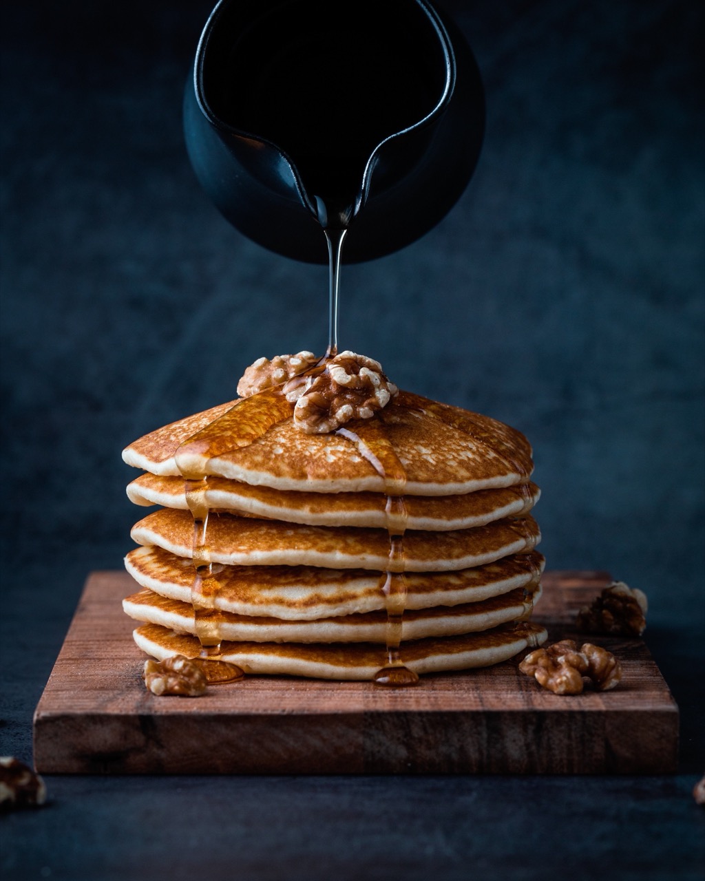 Pancakes with butter, syrup, or mix-ins