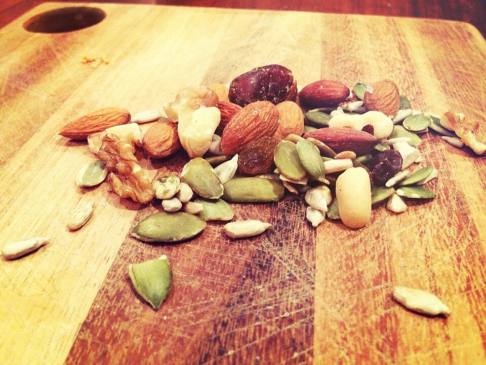 Bowl of trail mix with nuts and dried fruit